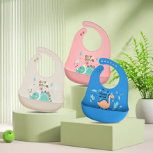 Load image into Gallery viewer, Waterproof Baby Bib - Adjustable Soft Silicone - Dinosaur Print - Easy Clean - Baby Feeding
