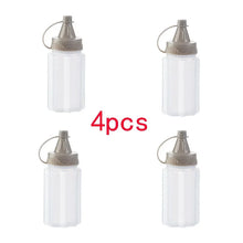 Load image into Gallery viewer, 4pcs Plastic Sauce Squeeze Bottle Mini Seasoning Box Salad Dressing Containers Outdoor Portable Barbecue Spice Jar Kitchen Tool